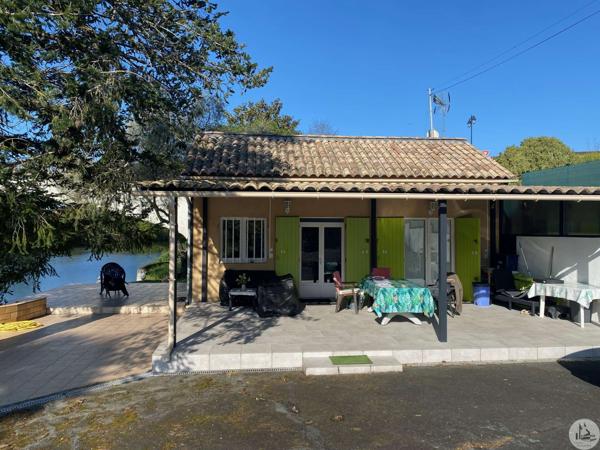 Petite maison sur un terrain en bord de Dordogne