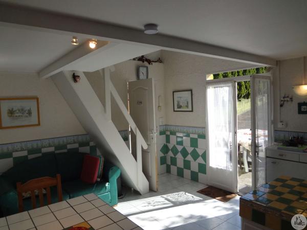 Petite maison sur un terrain en bord de Dordogne