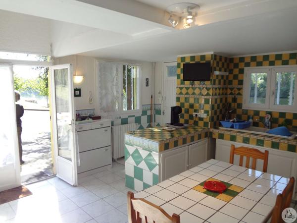 Petite maison sur un terrain en bord de Dordogne
