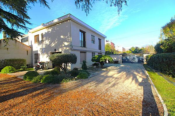 Maison d'exception en coeur de ville 400 m² habitables sur un parc de 1 200 m²