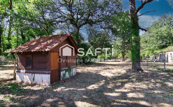 Maison mitoyenne 72m2 2 chambres sur sous-sol et grand jardin donnant sur le lac