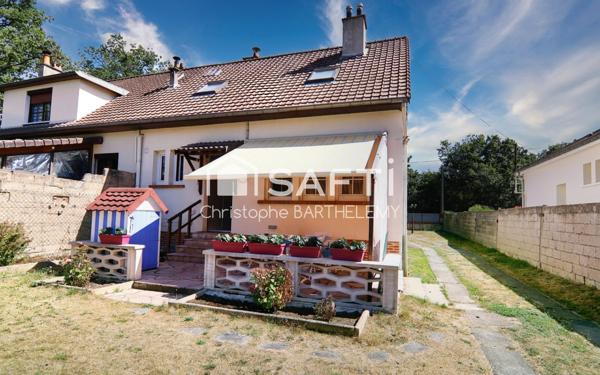 Maison mitoyenne 72m2 2 chambres sur sous-sol et grand jardin donnant sur le lac