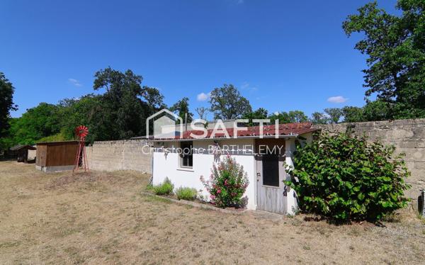 Maison mitoyenne 72m2 2 chambres sur sous-sol et grand jardin donnant sur le lac