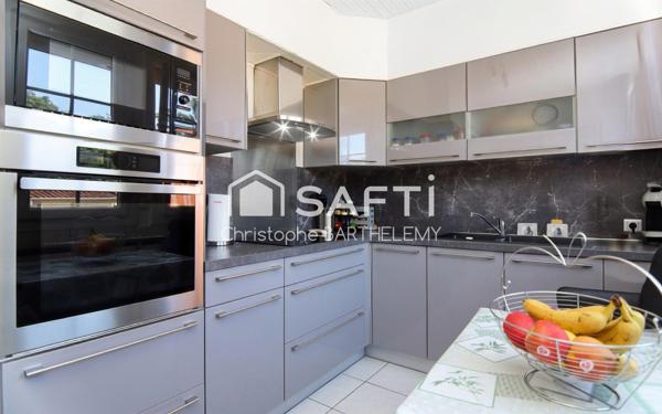 Maison mitoyenne 72m2 2 chambres sur sous-sol et grand jardin donnant sur le lac