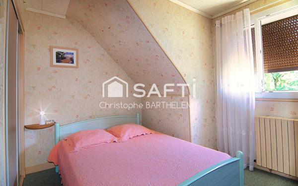 Maison mitoyenne 72m2 2 chambres sur sous-sol et grand jardin donnant sur le lac