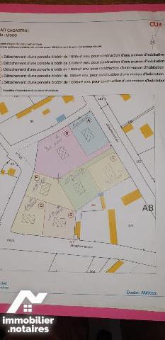 Une parcelle de terrain à bâtir non viabilisée (frais de division à la charge des vendeurs) LOT E