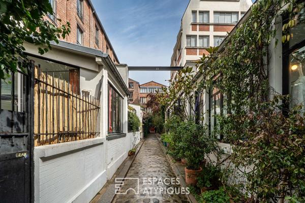 Loft à l’esprit atelier en arrière cour d’un ancien bâtiment industriel