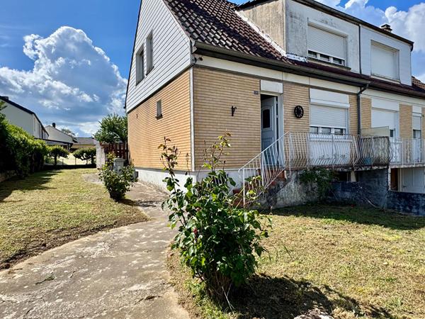 Maison à petit prix avec jardin, terrasse et garage / Fort potentiel