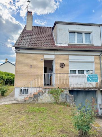 Maison à petit prix avec jardin, terrasse et garage / Fort potentiel