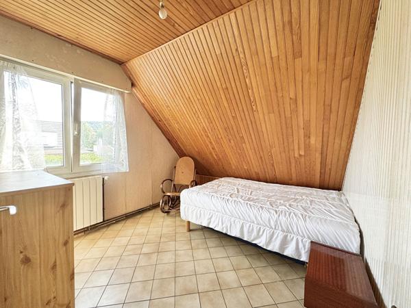 Maison à petit prix avec jardin, terrasse et garage / Fort potentiel