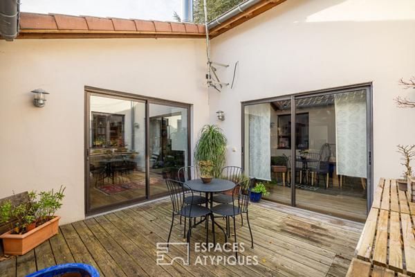 Ancienne imprimerie de plain-pied avec terrasse