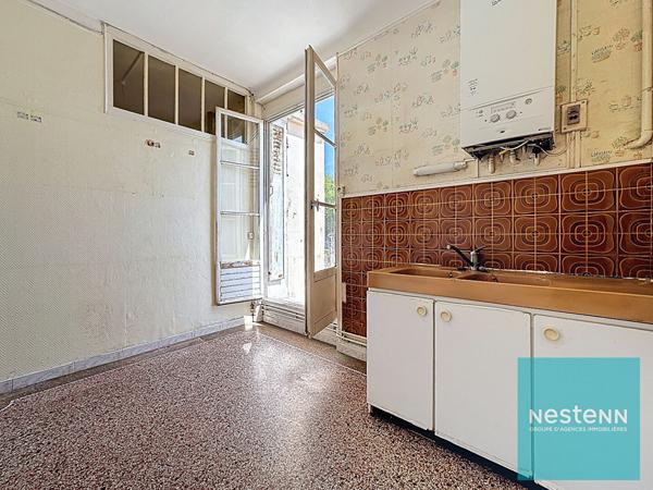 Appartement 4 pièces à vendre avec un balcon et un jardinet à Montereau Fault Yonne