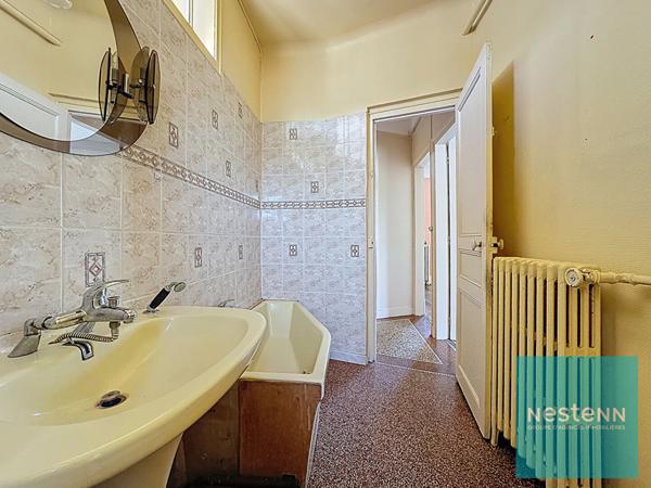 Appartement 4 pièces à vendre avec un balcon et un jardinet à Montereau Fault Yonne