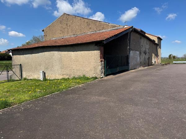 Immeuble à vendre BETTANGE sur terrain de 11,53 ares avec grange