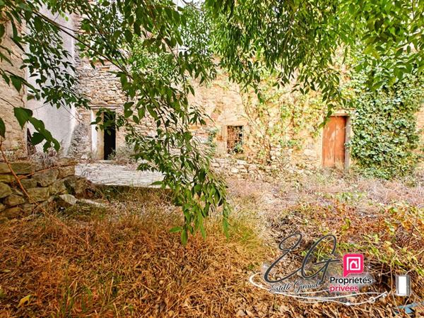 Maison en pierre à rénover :  jardin, garage, grenier aménageable