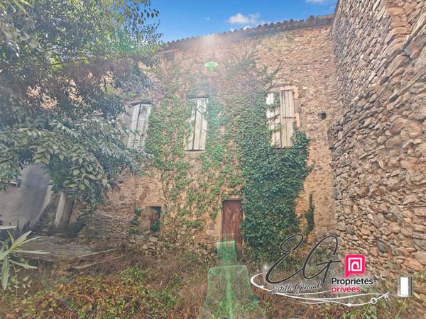 Maison en pierre à rénover :  jardin, garage, grenier aménageable