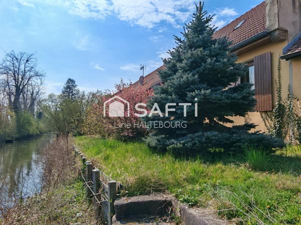 Appartement avec potentiel rez-de-jardin