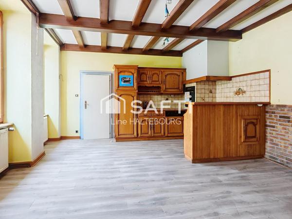 Appartement avec potentiel rez-de-jardin