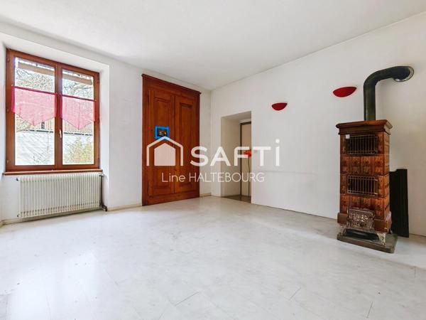 Appartement avec potentiel rez-de-jardin
