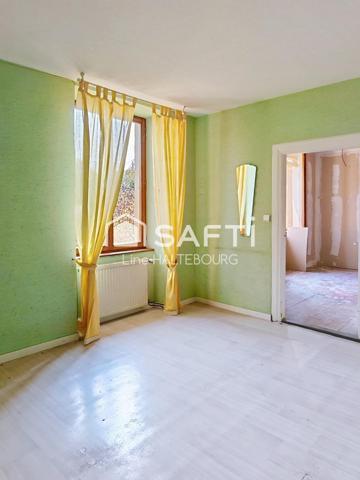 Appartement avec potentiel rez-de-jardin