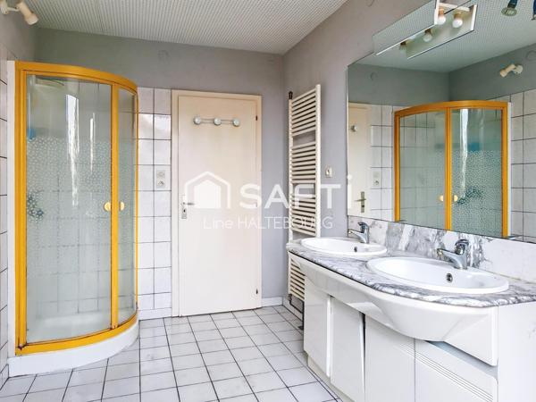 Appartement avec potentiel rez-de-jardin