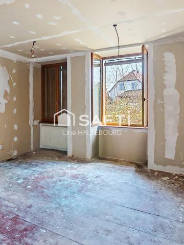 Appartement avec potentiel rez-de-jardin