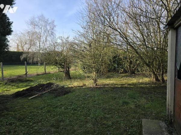 Maison semi mitoyenne sur une parcelle de 443m² 3 chambres jardin garage