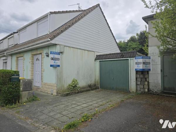 Maison semi mitoyenne sur une parcelle de 443m² 3 chambres jardin garage
