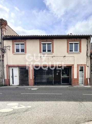 Immeuble de 150 m2 avec local commercial et appartement 85 m2