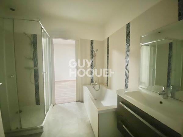 Immeuble de 150 m2 avec local commercial et appartement 85 m2