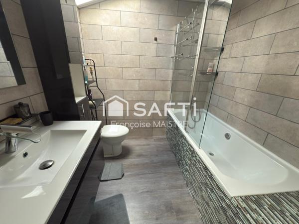 Maison rénovée de 156 m² avec véranda, balcon et parking