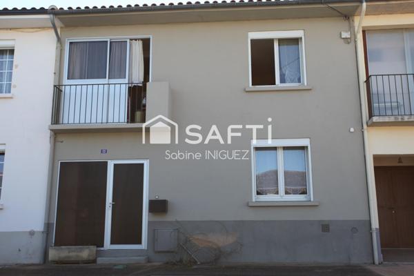 MAISON DE VILLE AVEC GARAGE ET JARDIN