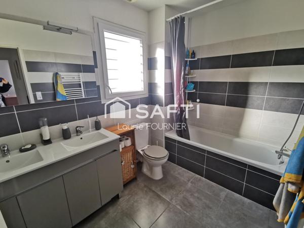 Maison avec locataire T4 80 m² avec garage et jardin