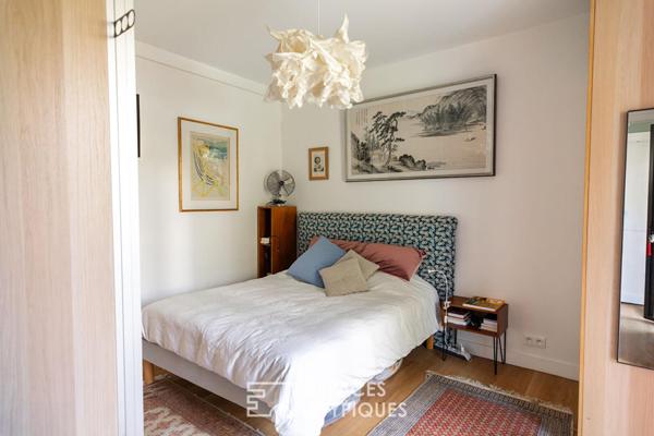 Maison de ville rénovée, volumes traversants et jardin paysagé