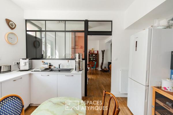 Maison de ville rénovée, volumes traversants et jardin paysagé