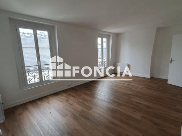 Location Studio 29.9 m² - 63 RUE GUY MOQUET Paris 75017