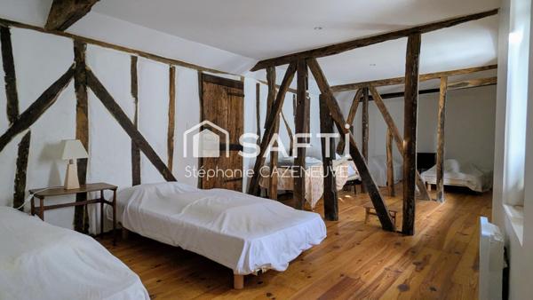 Bâtisse familiale 230 m² avec jardin et garage