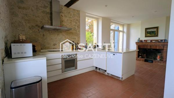 Bâtisse familiale 230 m² avec jardin et garage