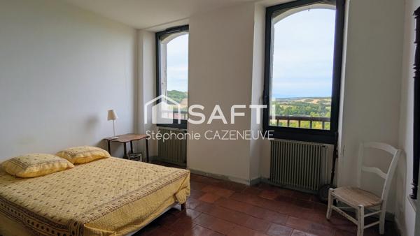 Bâtisse familiale 230 m² avec jardin et garage