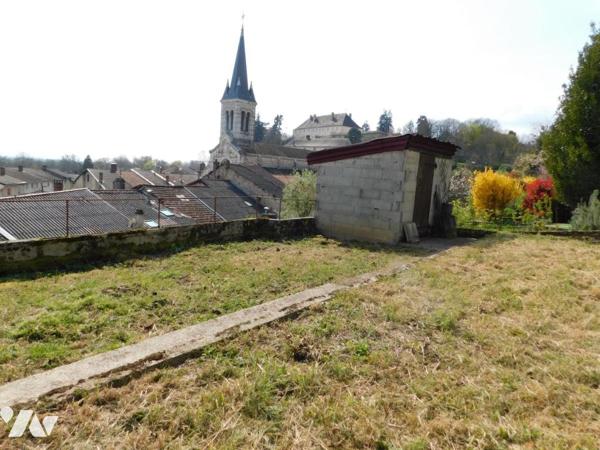 Maison de ville avec garage et jardin