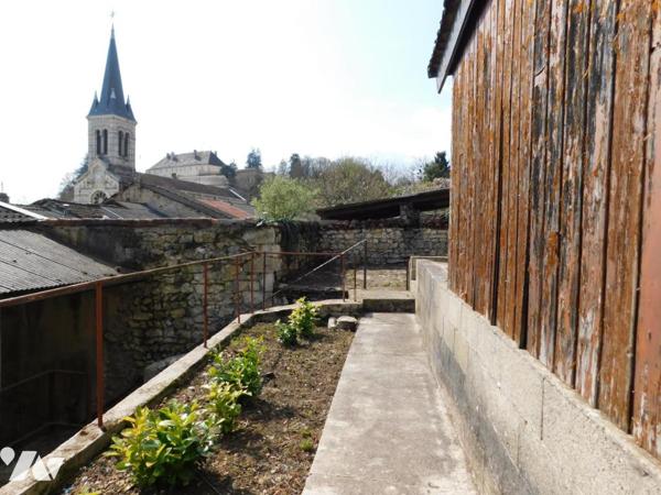Maison de ville avec garage et jardin
