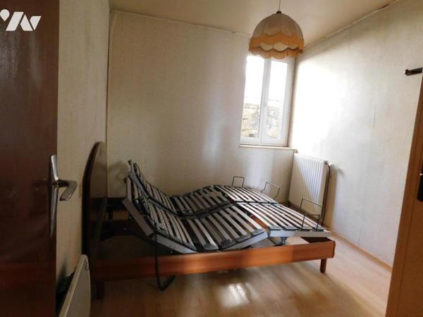 Maison de ville avec garage et jardin