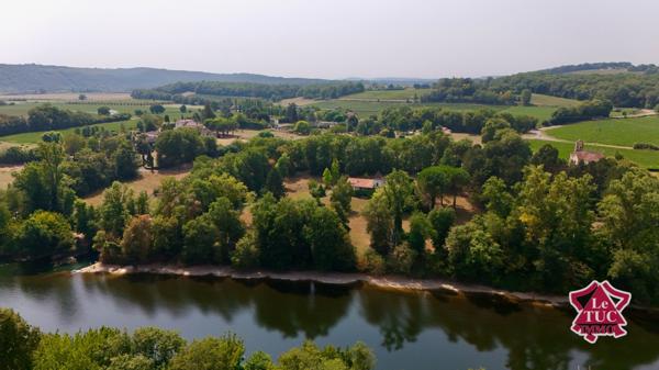 Propriété 5 chambres au bord du lot avec dépendance et garage. Soturac (46700)
