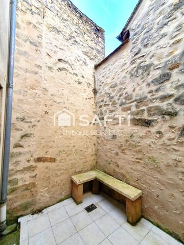 Maison de ville comme neuve avec pierres apparentes