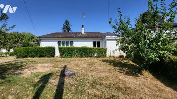 Dans un quartier résidentiel, Pavillon individuel sur 406 m² de terrain avec garage.