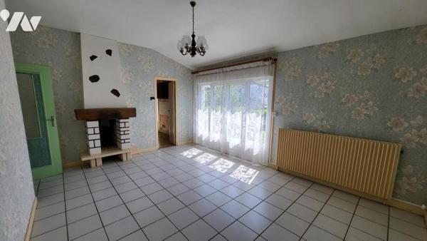 Dans un quartier résidentiel, Pavillon individuel sur 406 m² de terrain avec garage.