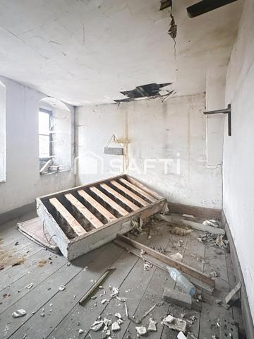 Immeuble de 450 m2 à rénover Avec 2 garages en RDC