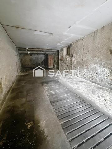 Immeuble de 450 m2 à rénover Avec 2 garages en RDC