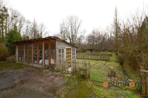 Propriété de 4 chambres au bord de la rivière à vendre