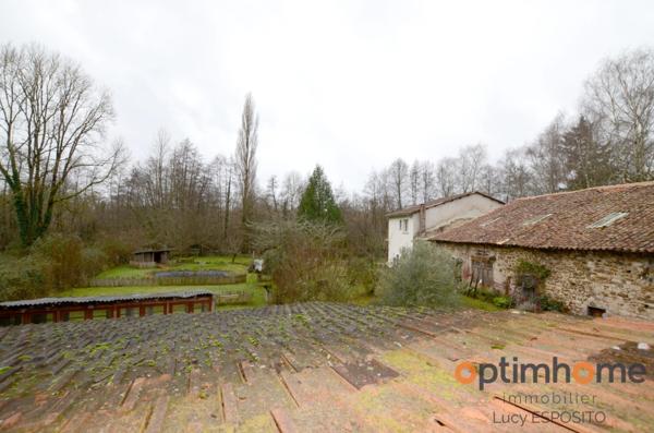 Propriété de 4 chambres au bord de la rivière à vendre